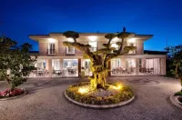 B. Equine Range Hotel