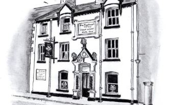 a black and white sketch of a traditional building with a sign on the front at The Feathers