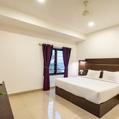 Deluxe Room Hotel Mountain Hues Promo Code