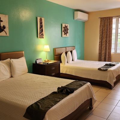 Standard Room, 2 Queen Beds Combate Beach Resort Promo Code