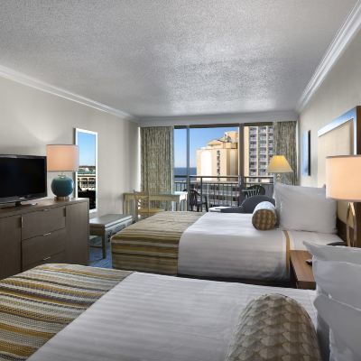 Standard Room, 2 Queen Beds, Angle View Coral Beach Resort Promo Code