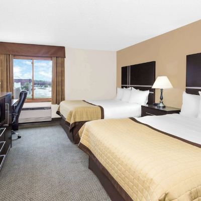 Deluxe Queen Room with Two Queen Beds - Non-Smoking - Pet Friendly Baymont by Wyndham Green Bay Promo Code