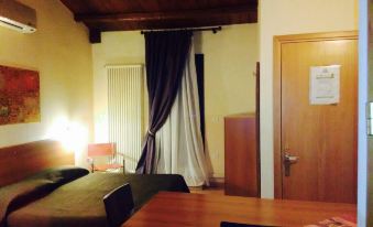 Corato Room Economy