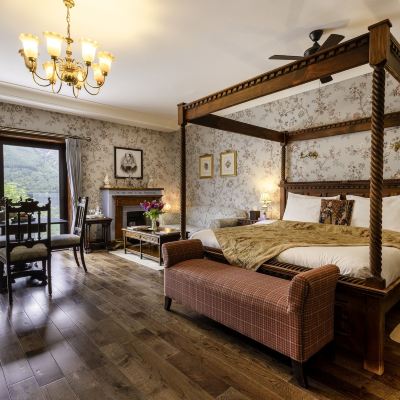 Superior Four-Poster Suite The Whispering Pine Lodge Promo Code