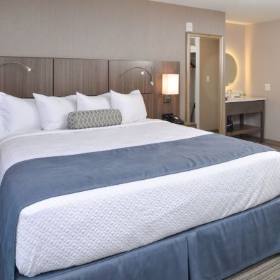 King Room with Balcony Anchored Inn at Hidden Harbor Promo Code