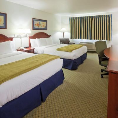 Suite 2 Queen Beds Sofabed Non Smoking GrandStay Hotel & Suites Becker Big Lake Promo Code