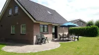 Detached vacation home with enclosed garden close to the Wadden coast Hotels in 
