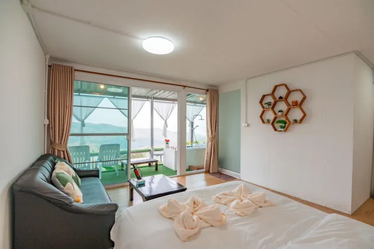 ห้องเตียงใหญ่พร้อมวิวภูเขา