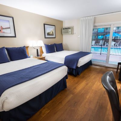 Signature Room, 2 Queen Beds Ground Floor, Patio (2 Queen Beds Nonsmoking) King Frederik Inn Promo Code