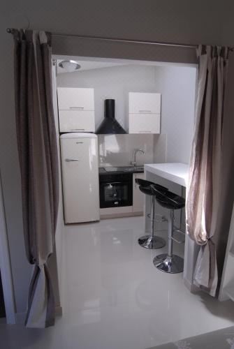 舒适一室公寓 - 配有双床和露台