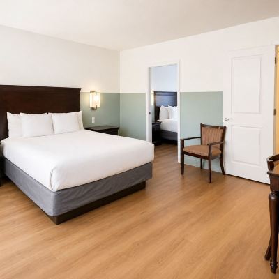 One Bedroom Two Queen Suite with Balcony Stargazer Inn and Suites Promo Code