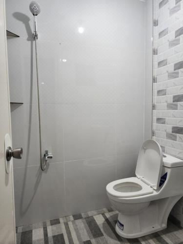 Green Glory Staycation in Amadeo Two-Bedroom House