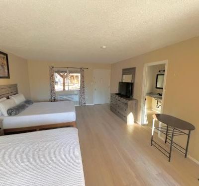 Budget Double Room TimberLodge Inn Promo Code