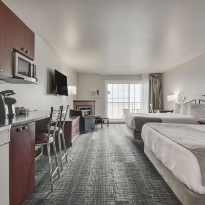 Pavilion Section | Standard Room, 2 Queen Beds, Courtyard Area Hôtel le Petit Manoir du Casino Promo Code