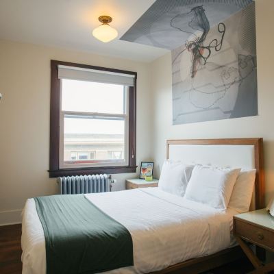 Compact Room Interior View, Shared Bathroom Selina Commodore Astoria Promo Code