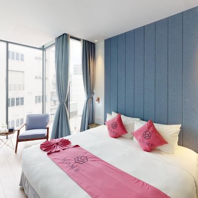Deluxe Room 1 Queen bed HOME Hotel Promo Code