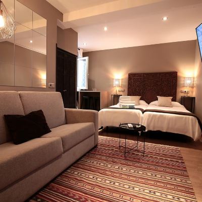 Quadruple Room with Shared Bathroom AbraCadabra Suites Promo Code