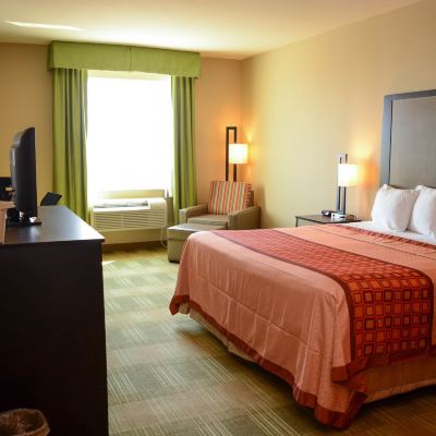 Deluxe King Room-Non-Smoking Coratel Inn & Suites by Jasper Cotulla Promo Code