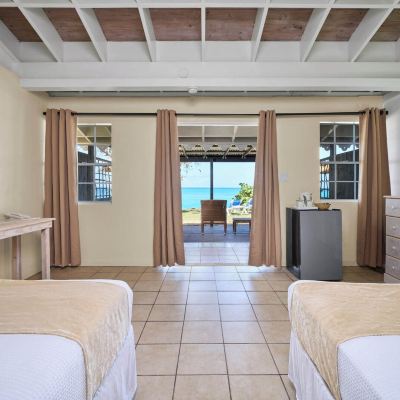 Beachfront Bungalow (2 Double Beds) Hawksbill by Rex Resorts - All Inclusive Promo Code