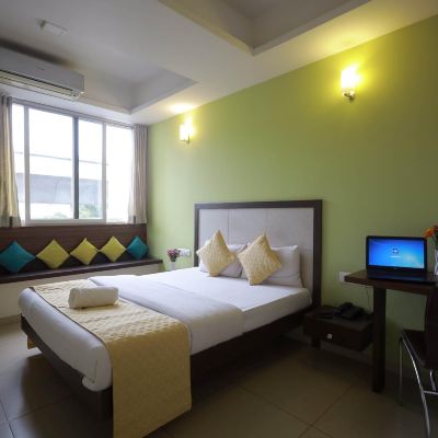 Deluxe Room Ixora Suites Promo Code