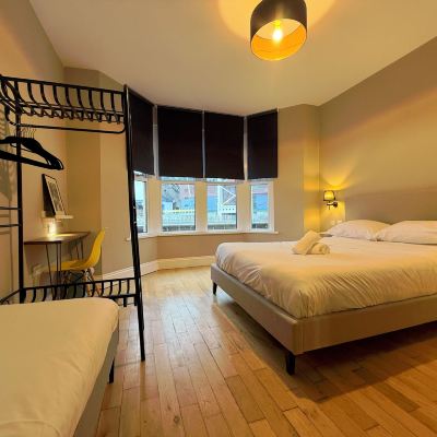 Signature Triple Room, Shared Bathroom The River House Promo Code