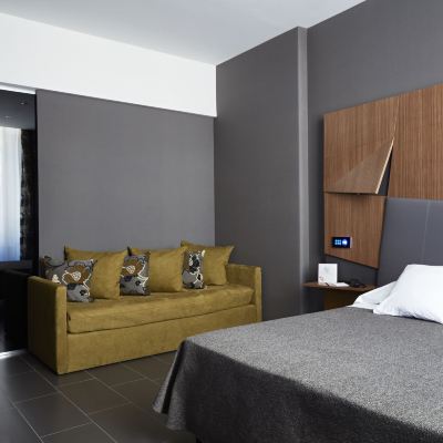 Classic Triple Room Hotel the Building Promo Code