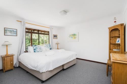 Nature's Retreat Eagle Bay Four-Bedroom House