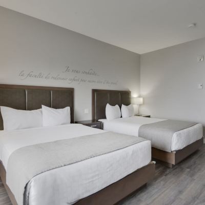 Hotel | Economy Room, 2 Queen Beds Courtyard View Hôtel le Petit Manoir du Casino Promo Code