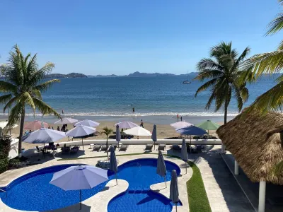 Breathtaking ocean front condominium in the gated community of Club Santiago Hotels in 
