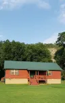 Beautiful cabin style home backing up on the White River!