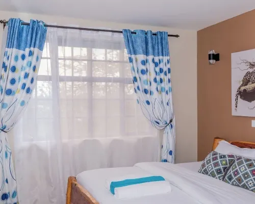 Lux Suites Enkarsis Bungalow Kisaju Hoteles en Central