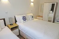 德文郡海岸海景公寓酒店