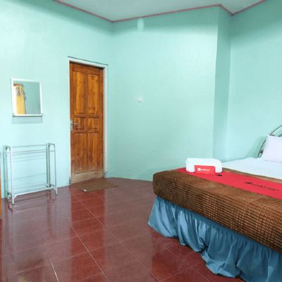 RedDoorz Family Room RedDoorz Near Mangrove Forest Kupang Promo Code