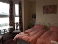 Bayside Guest House Отели в г. 