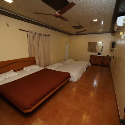 Standard Quadruple Room, 1 King Bed Gujarat Bhavan Hotel Promo Code