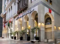 Millennium Al Aqeeq Hotel Hotele w: 