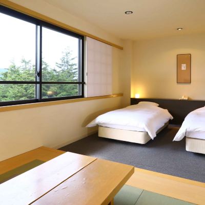 温泉ルーム(ツイン+4.5畳)[和洋室][禁煙] 万座温泉 日進舘 クーポン