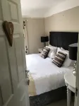 ذا كوتش آند هورسيز إن