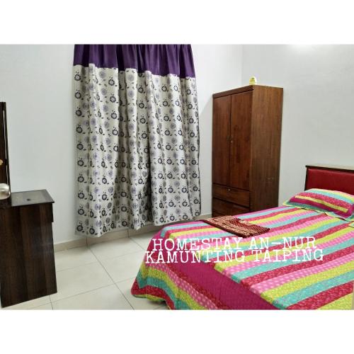 Homestay An-Nur Kamunting三卧室房屋