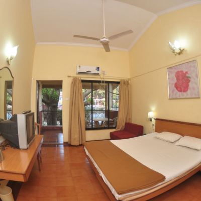 Deluxe King Room Gujarat Bhavan Hotel Promo Code