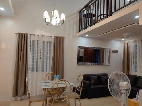 Green Glory Staycation in Amadeo Two-Bedroom House