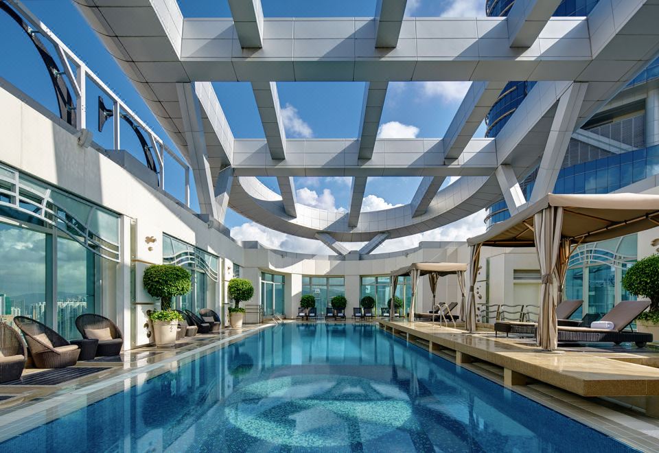 There is a swimming pool located near Hotel Indigo, which is a luxury resort and spa at Cordis, Hong Kong