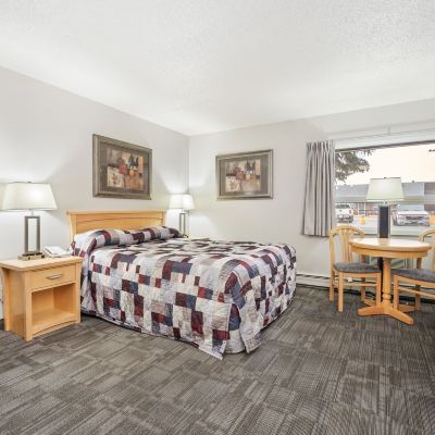 Deluxe Queen Room Guest House Inn & Suites Promo Code