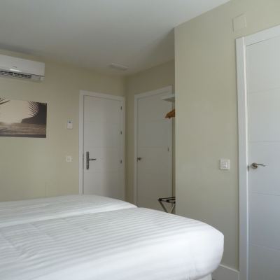 Family Quadruple Room, 2 Bedrooms, Patio (Deluxe) La Caleta Bay Promo Code