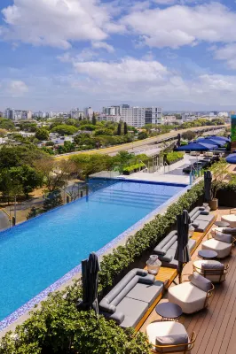 AC Hotel Santiago de Los Caballeros Отели в г. 