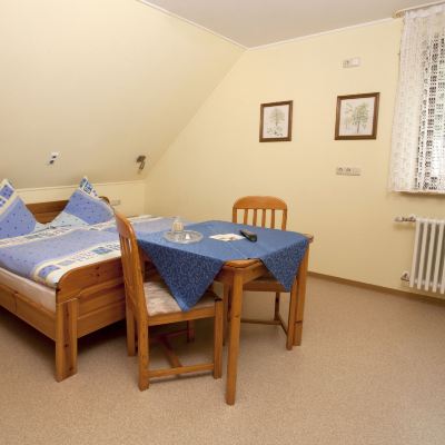 Standard Triple Room Haus Hubertus Promo Code