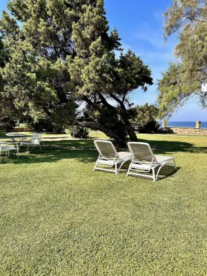 Genari Beach Apartments Отели в г. 