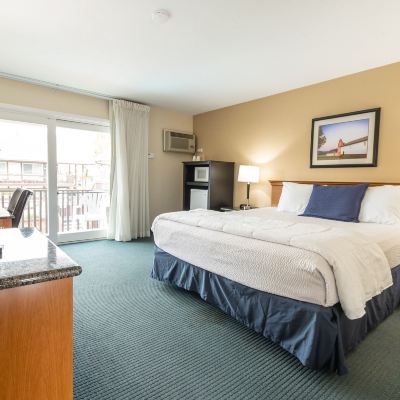 Signature Room, 1 King Bed Upstairs, Balcony (1 King Bed Nonsmoking) King Frederik Inn Promo Code
