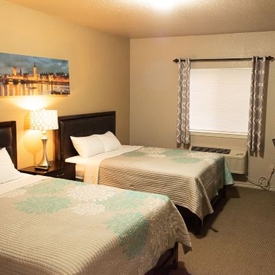 Deluxe Room-2 Queen Beds Premium Inn and Suites Promo Code