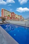 إكستينديد سويتس ثيوداد ديل كارمين أيروبويرتو